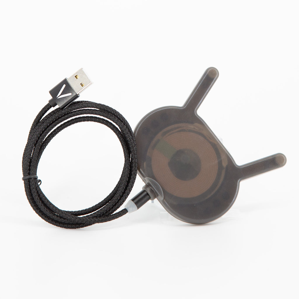 VOID wireless charger with its black braided magnetic USB cable